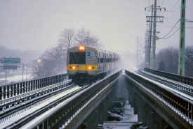 Merrick-Brooklyn-Ave_entering-station_viewW_winter-action_2004.jpg (110220 bytes)