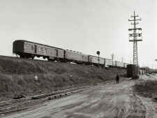 REA-RPO Car 743 on Rear of Train Passing Signal S110 and Switching Track -Spfd. Branch-St. Albans - 02-12-57 (Faxon-Keller).jpg (129519 bytes)