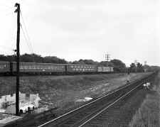 Seq 2 - MU Train E on Springfield Branch Approaching Spfd. Jct. -Laurelton-View NE - 08-31-57 (Faxon-Keller).jpg (125104 bytes)