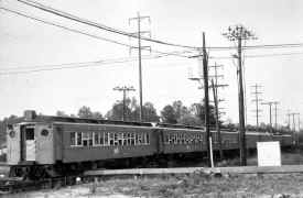 MU Train-Roosevelt Raceway Special-at Former Hempstead Xing-Country Life Press-c. 1959 (Keller).jpg (82526 bytes)
