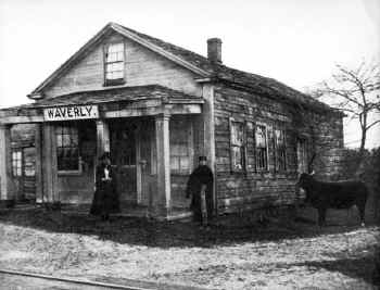Station-Waverly (Holtsville) Agent M. E. Bloomer - View SE -c. 1880.jpg (117150 bytes)