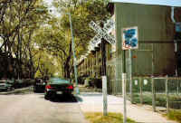 lirr-crossing-sign_Evergreen-Branch_Hancock- St.-1998_Robert-Anderson.jpg (81151 bytes)