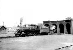 OB enginehouse D56 out front 4-4-0 steam locomotive 27 showing.jpg (64110 bytes)