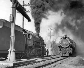 lirr113_2-8-0 Class H10s_meet_lirr38-G5s_Smithtown_viewE_1951_Norman-Kohl.jpg (138014 bytes)