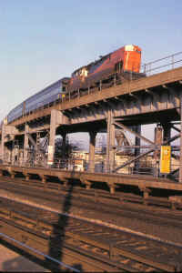 C420-217-Parlor-Train-Montauk-Br-Viaduct-Hillside-6-66.jpg (125418 bytes)